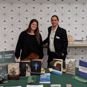 Olivia Stockwell with Dr. Eric Hoenes at an event for new students